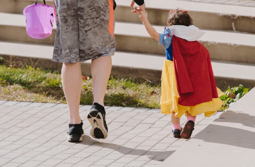 toddler wearing snow white costume
