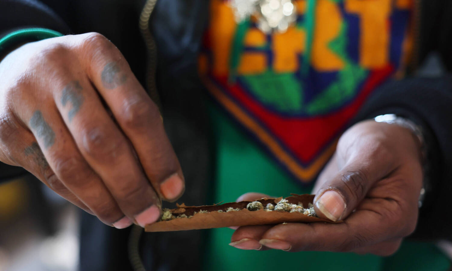 Rolling a marijuana cigar